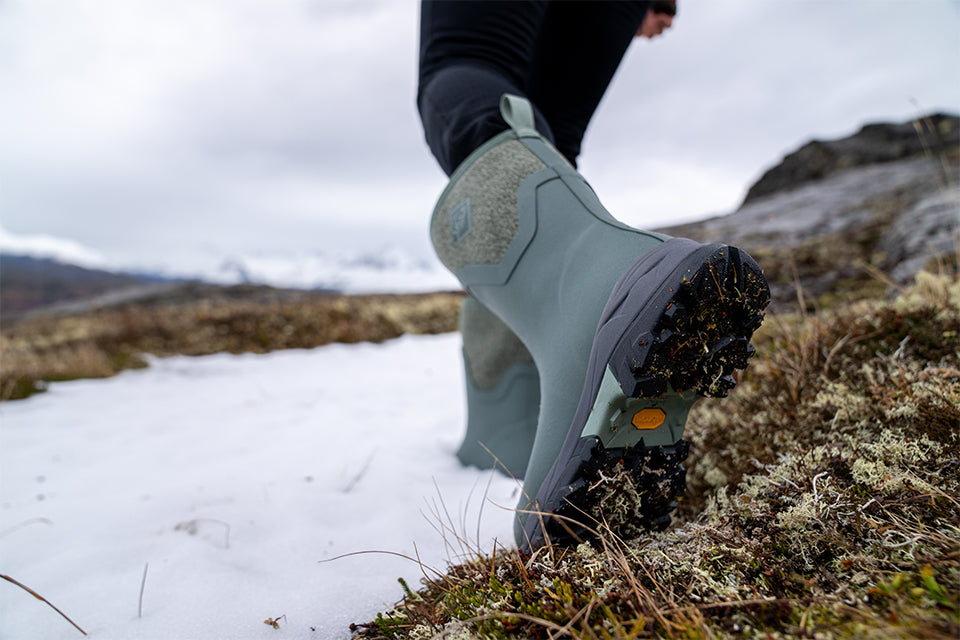 Winter hike in rugged, icy terrain