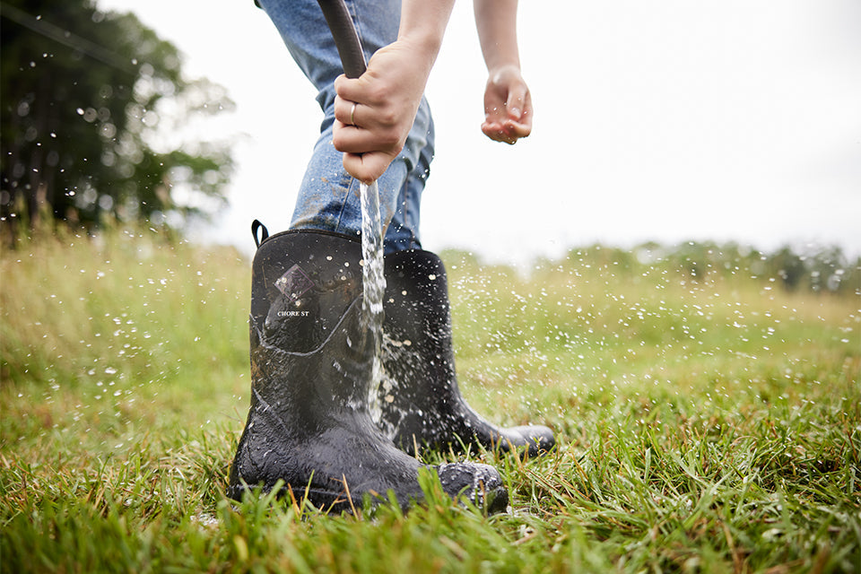 Hosing off a rubber and neoprene Chore Mid Women's boot