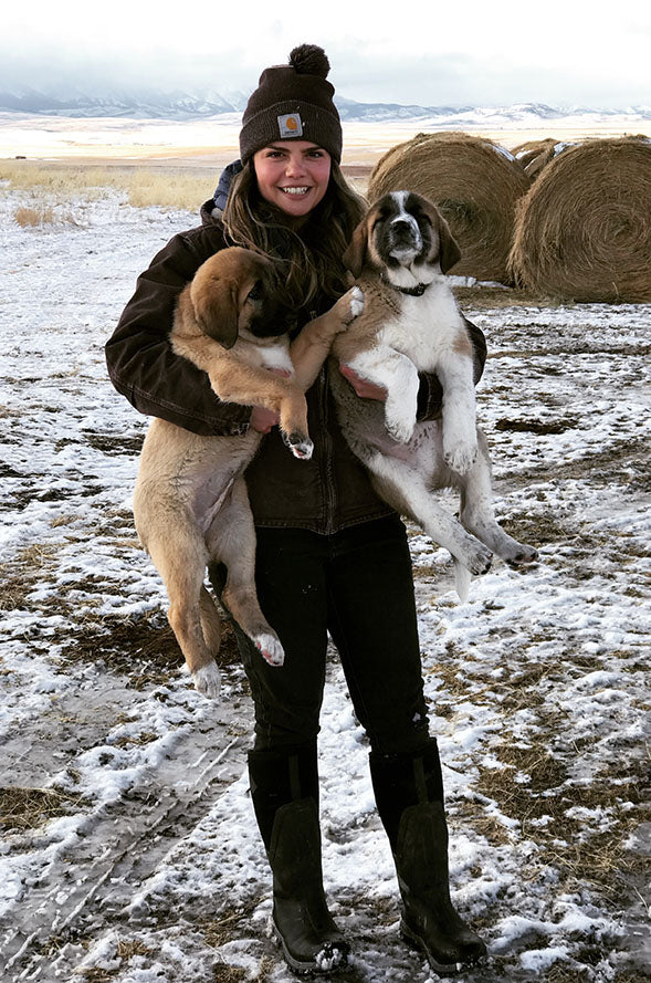 Abbagail M holding her two dogs