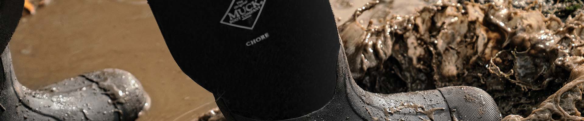 Muck Chore Boots walking through mud and keeping your feet dry