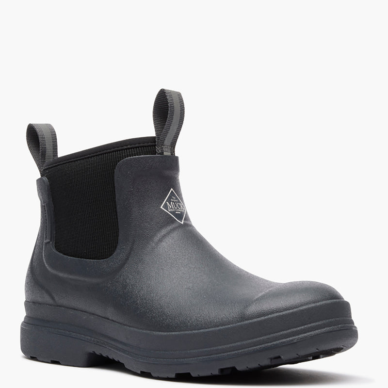 Black rubber boot with elastic sides on a white background