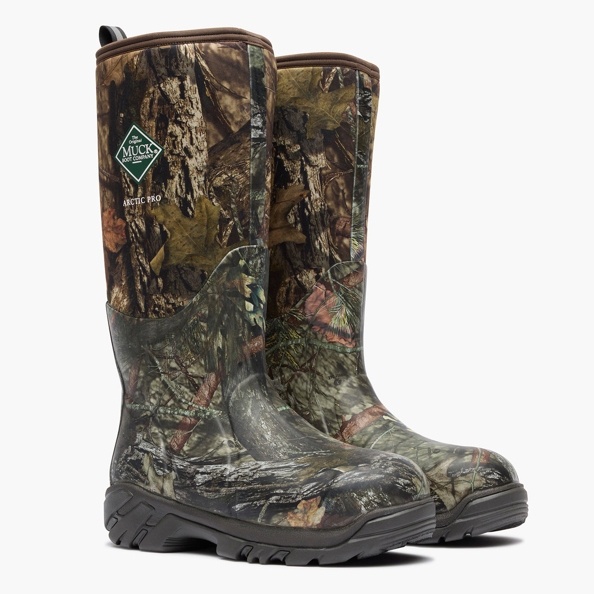 A pair of Mizzz Arctic Roo tall hunting boots in a realistic woodland camouflage pattern, featuring a dark rubber toe cap and sole, shown against a plain white background.