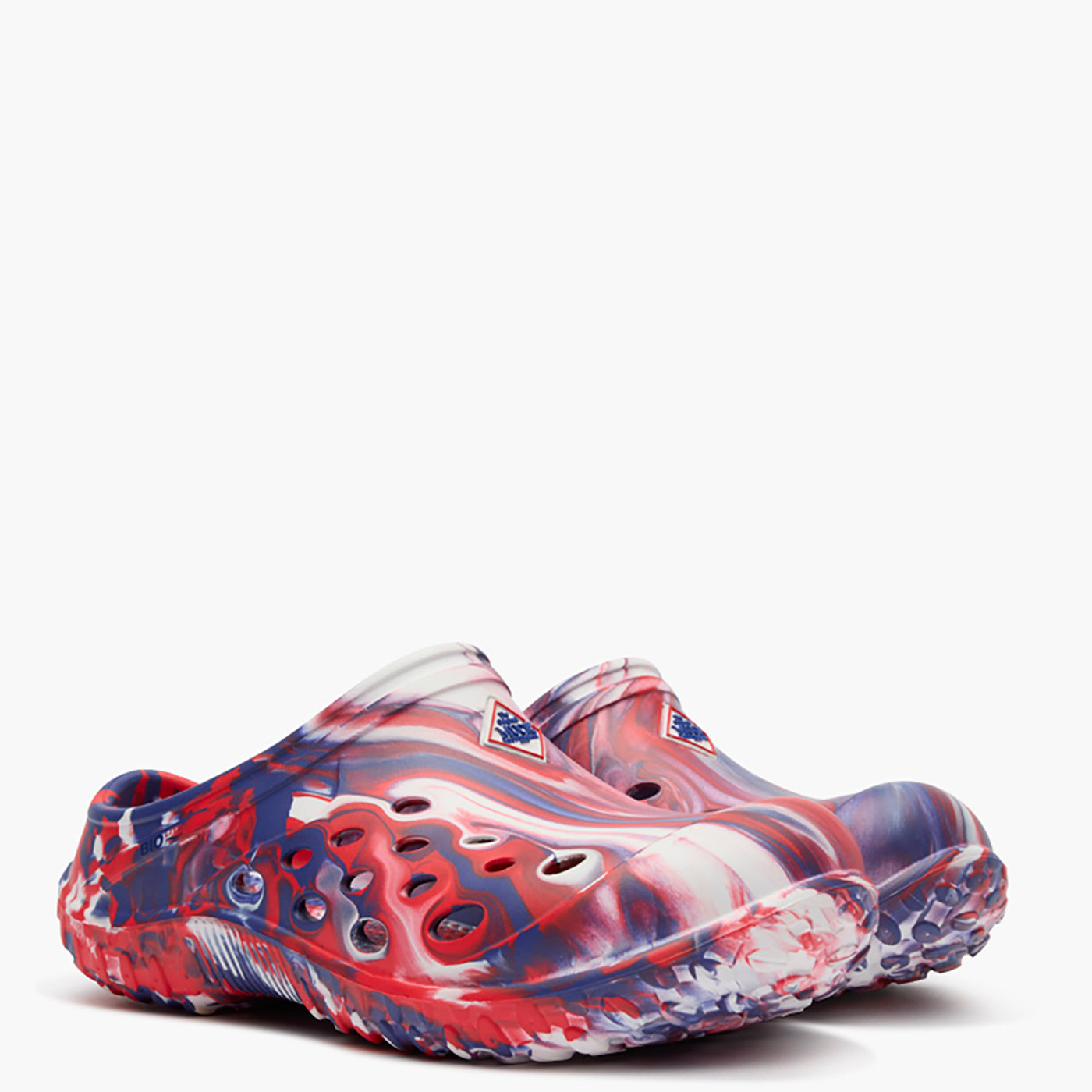 Marbled red, white, and blue sandal on a white background