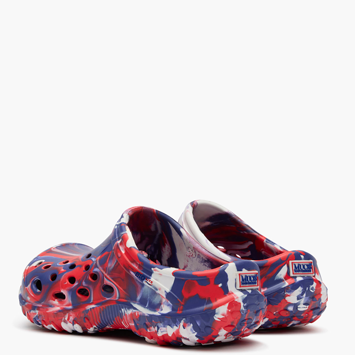 Colorful clogs with an american swirl  pattern on a white background