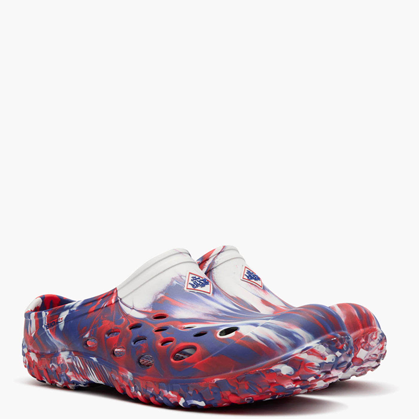 Pair of colorful clogs with a pattern on a white background