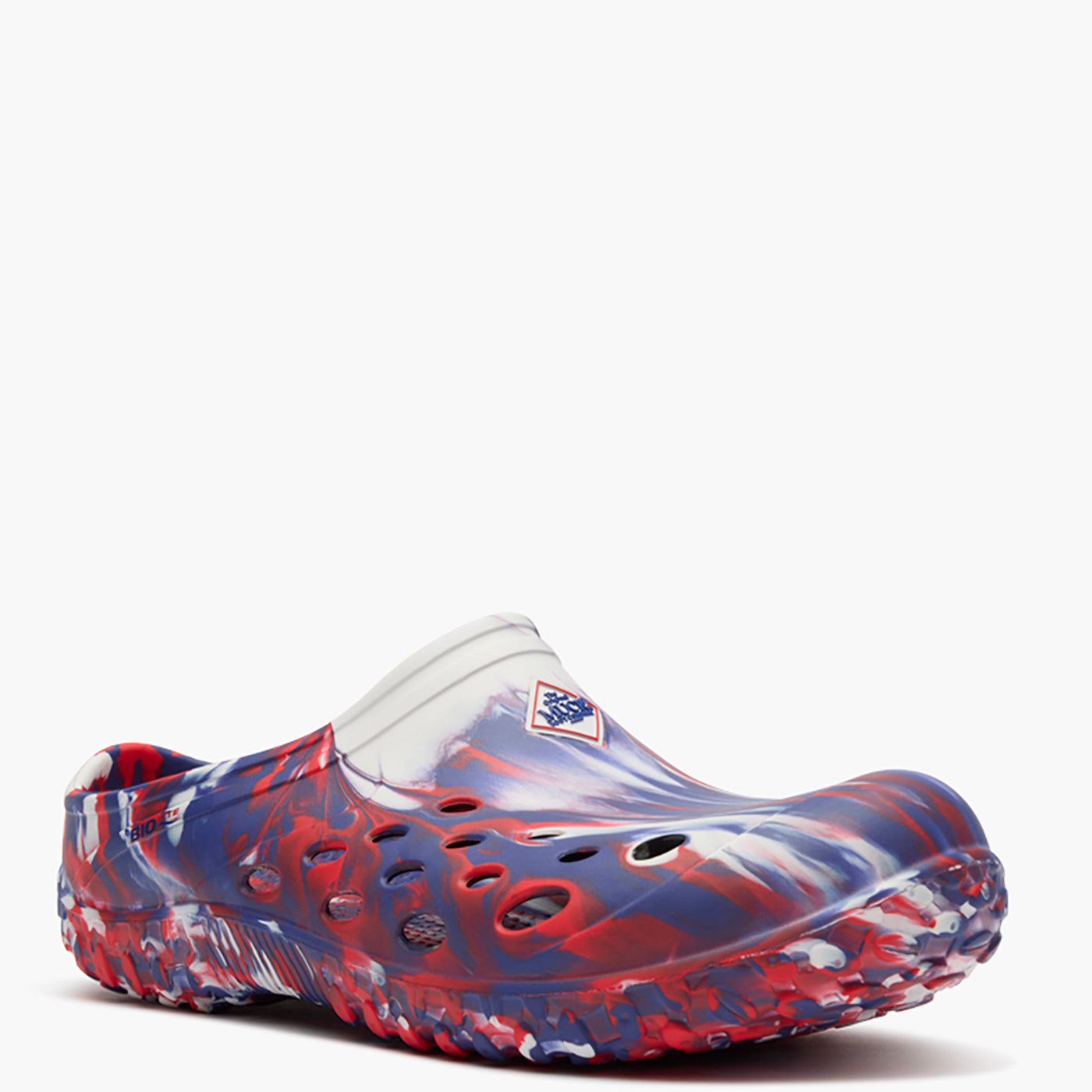 Colorful clog shoe with abstract pattern on a white background