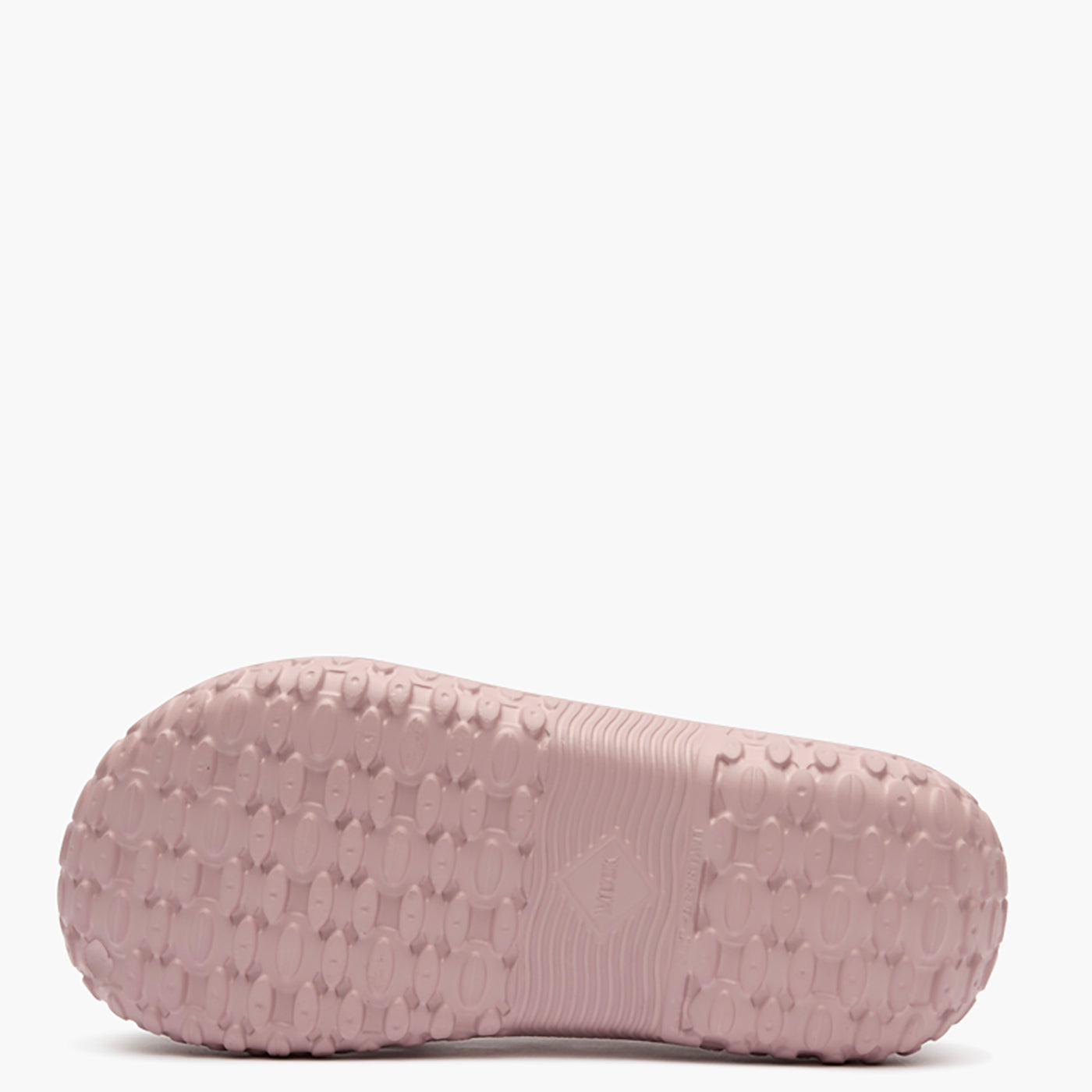 Pink slipper with textured sole on a white background