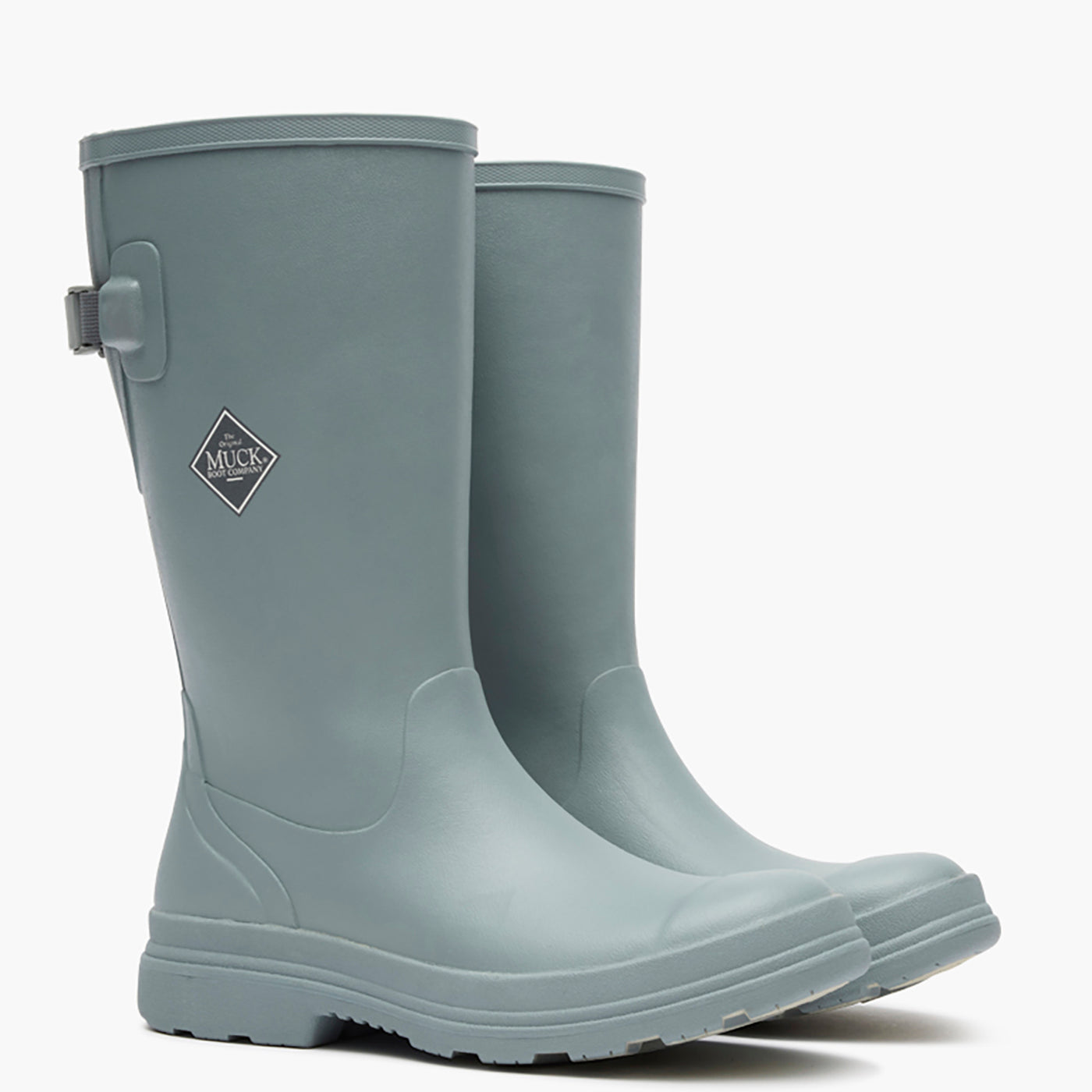 Pair of gray rubber boots with a visible brand logo on a white background