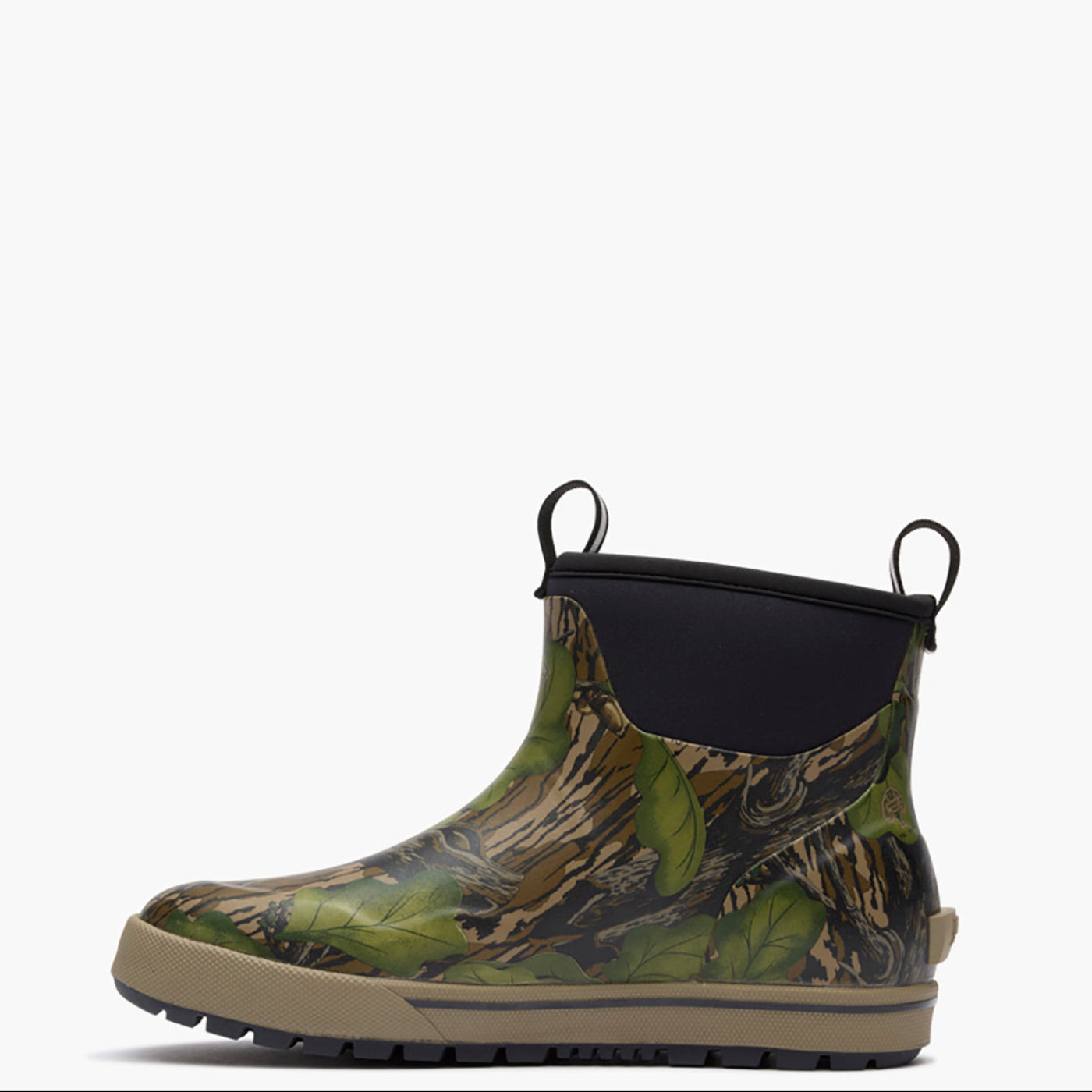 Camouflage-patterned Muck boot with a black pull tab on a white background