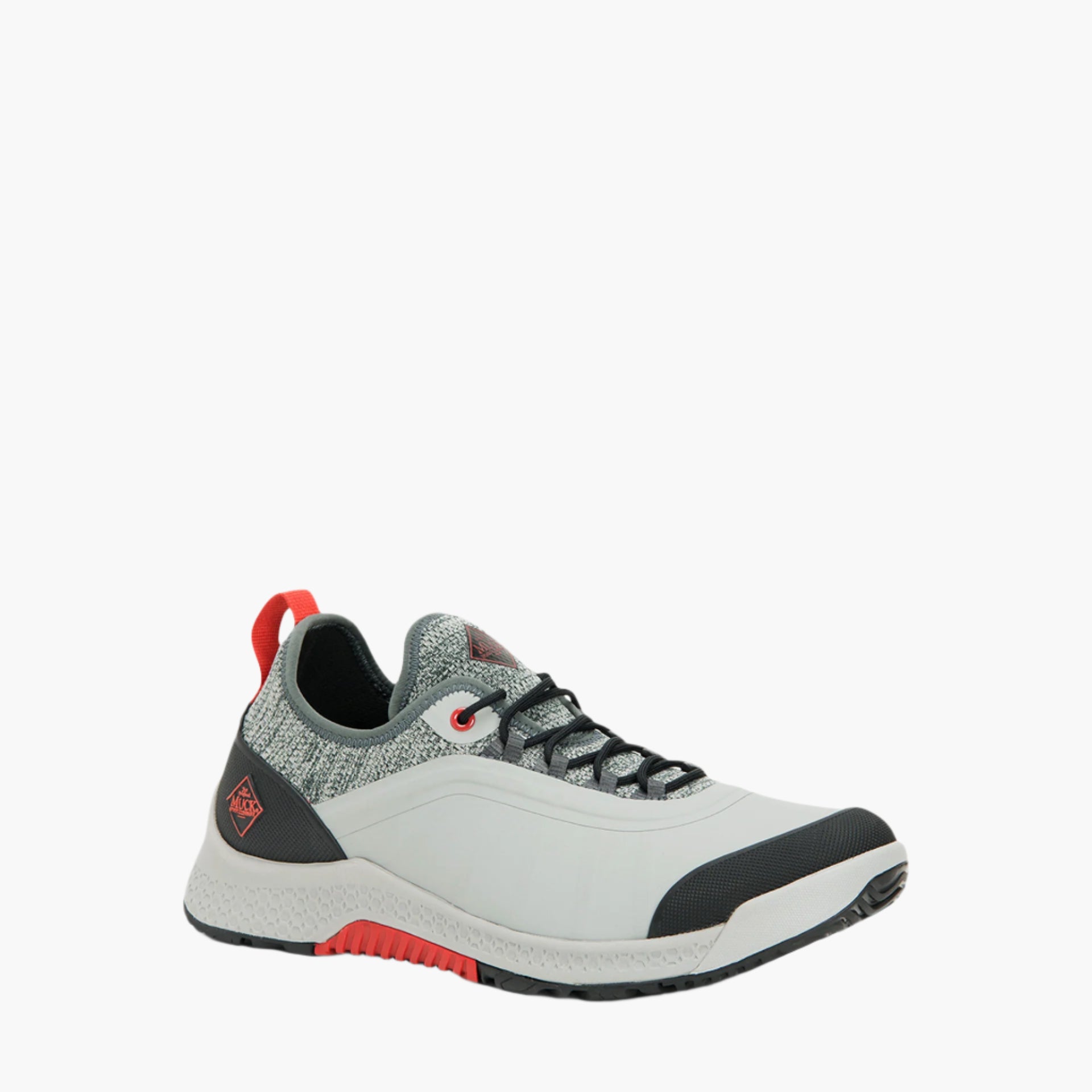 Gray and black sneaker with red accents on a white background
